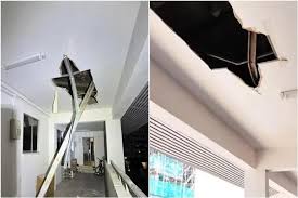 Construction work suspended at Chong Pang City after metal bar falls through HDB block roof