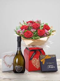 Please note that with global coronavirus pandemic getting under control, we adjusted to a 'new normal' and fully resumed a delivery service in the uk and in most countries. Ruby Kisses Anniversary Gift Set Aberdeen Flowers