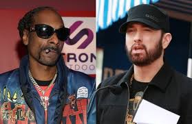 (born october 20, 1971), known professionally as snoop dogg (previously snoop doggy dogg and briefly snoop lion), is an american rapper and media personality. Eminem Pounds Snoop Dogg On Surprise Album Music To Be Murdered By Side B Song Zeus Audio