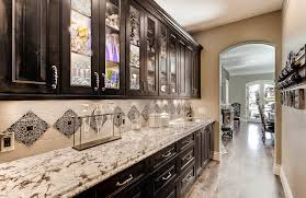 Custom made cabinetry opens you to a bevy of accessories that allow you to organize the way you want. 2017 Wood Diamond Award The Artisan Shop Cabinet Makers Association