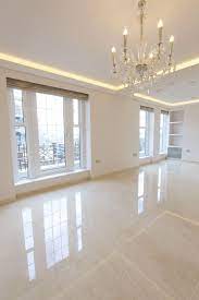 The floor in your home has to put up with a lot, whether in the kitchen, hallway, entrance, conservatory or lounge. Elegant Penthouse Living Room With Glossy Floor Tiles With A Marble Effect Tiles From The Masterpie Pisos Para Casas Modernas Casas De Un Piso Piso Interiores