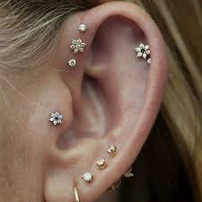 The Curated Ear Is Summer S Biggest Trend You Need To Try Cool Ear Piercings Pretty Ear Piercings Unique Ear Piercings