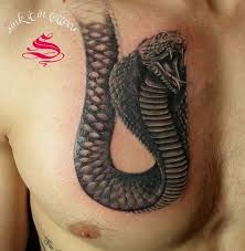Go for blue, red & black ink options if you want to make your tattoo work. King Cobra Tattoo Arm In 2021 Cobra Tattoo King Cobra Tattoo Snake Tattoo Design