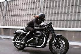 from japan candy50s looking badass as can be on her harley sportster roadster send your photos to contact croig co to be featured croig caferace
