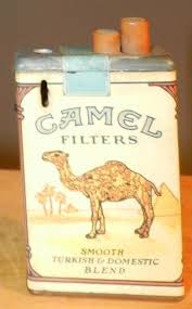 A set of 2 vintage camel cigarette lighters both have boxes one says camel lights, this one has been used and shows wear one has joe camel playing piano, in good condition, lights. Pin On Products I Love