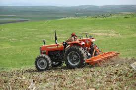 This Image Of A Tafe 7502 4wd Tractor Cultivating The Slopes Of A Hilly Farm In Algeria Is A Perfect Example Of Tractors Farm Machinery Tractor Manufacturers