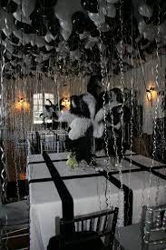 A black tablecloth overlayed with white lace, white glitter i would personally like an old hollywood theme with black and white movies rolling on screens during the evening and all the decor and ideas that go with that. Pin By Lisa Maddox On Party Ideas White Party Decorations Black And White Party Decorations White Party Theme