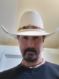 American Lucky 7x Beaver/ Bone Decided to add a bit of flare. Old-school  Pheasant feather band.. Didn't want to Take Away from this hat by taking  off the original band,so i stacked