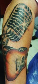 We did not find results for: Musik Tattoo Von Scheinendem Mikrofon Und Giterre Am Unterarm Tattooimages Biz