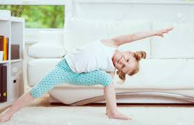 Yoga movement yoga for kids yoga teacher at home workouts twisters classroom wellness teacher resources breathe. Cute Little Child Girl Making Morning Exercises And Yoga At Home Stock Photo Picture And Royalty Free Image Image 140639932