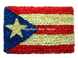 The victims had a large puerto rican flag waving from their car when they were approached by a mob of black men and pulled from the vehicle and shot. Puerto Rico Flag Funeral Flowers