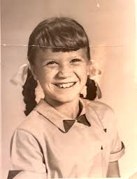 Arthur (Douglas and Moultrie Counties) early 1900s. The man and little girl  are not identified..