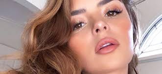 Demi Rose Wears Nothing Beneath Her Unbuttoned Jacket