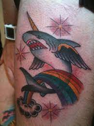 These animals were usually tattooed on the feet or behind the ankles.they traditionally symbolized survival from a shipwreck, and. Rainbow Jumping Pega Shark Tattoo Picture Last Sparrow Tattoo Shark Tattoos Terrible Tattoos Picture Tattoos