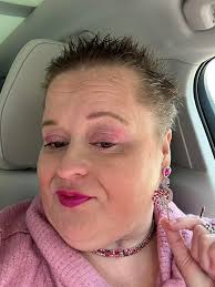 My flamingo skirt and earrings giving to me for Christmas by my GF  Susan.Also a flamingo fan.