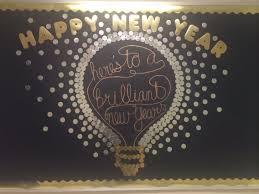 The new year is a blank book. Happy New Year Here S To A Brilliant New Year Bulletin Board This Bulletin Board Took A Lot Winter Bulletin Boards Bulletin Boards Classroom Bulletin Boards
