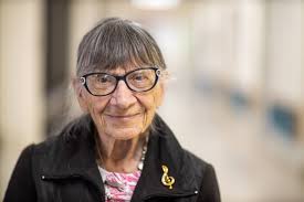 Madeline Cook is 93 years old and has been one of our volunteers for over  20 years. She plays piano for an interactive sing-along as part of the  therapeutic programming for patients