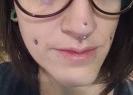 Spent some time last night glueing old unused jewelry bits to my face. ☺️  The rhino is the one I really want! I'd love to have both nostrils done  high and low.