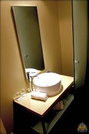 What companies run services between singapore changi airport (sin), singapore and mandarin oriental, singapore (sg clean), singapore? Photo Review Protea Hotel Transit Johannesburg Airport Terminal A