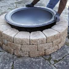 Whether it's a warm summer night or a crisp fall afternoon, an outdoor fire pit can be a perfect gathering spot for friends and family. A Quick And Easy Do It Yourself Firepit Surround Outdoor Fire Pit Diy Fire Pit Outdoor Projects