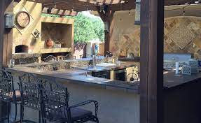 It's dark, durable, resistant to the elements, and beautiful. The Best Outdoor Countertop Materials Plus Design Ideas