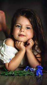 Cute funny baby face expression. Lose The Mascara And Cover The Shoulder Stop Objectfying Children This Child Would Be Beautiful With Beautiful Children Beautiful Babies Cute Baby Pictures