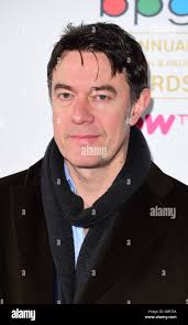 Peter Straughan attends the 42nd Broadcasting Press Guild Awards (BPG) at  the Theatre Royal in London Stock Photo