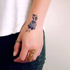 Vector henna paisley tatoo mandala. 31 Small Hand Tattoos That Will Make You Want One Styleoholic