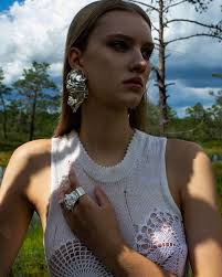 Summer vibes by @zylely 🌾 Textile & cloth design: Kristina Oja  @kristina.oja Model: Anete @anete_aas Photos: @zylely Jewellery available  @estoniandesignhouse #silverjewelry #silverrings #silversmithing #nature  #contemporaryjewellerydesign ...