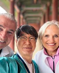 Our first full day was a little soggy in Asia,, but full of adventure and  sightseeing. From the change of the guard, to a delicious traditional  Korean lunch, followed by a visit