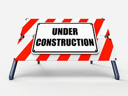 Free Stock Photo of Under Construction Sign Shows Partially Insufficient Construct | Download Free Images and Free Illustrations