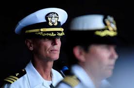 Cmdr. Michael Hall, USS Wasp command chaplain, watches