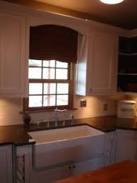 How To Install A Kitchen Cabinet Valance Ehow Installing Kitchen Cabinets Modern Kitchen Lighting Kitchen Remodel Small