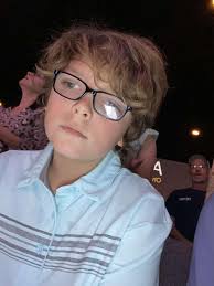 Cicero and Gay (akers) Cox family. They had two sets of twins. The twin to  Brady died an infant. I have forgotten the name of the lady seated. Ovada  was my mother.