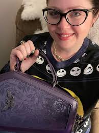 Look what I got for Christmas my daughter got me the book and hubby the  purse best gifts ever!!