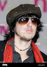 Sami Yaffa of The New York Dolls poses at an instore signing at HMV