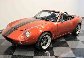Image result for Hailey Orange 1966 Mazda