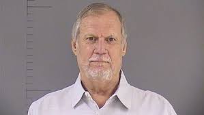 Man charged with murder after shooting someone in a car outside his home.  He claims self-defense