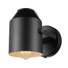 Bending gracefully from the wall, an iron base supports a sleek glass shade for a chic sconce. Plug In Wall Sconces Lighting The Home Depot