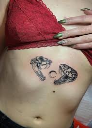Replicating this tattoo is always a herculean task; Snake Skull Tattoos Meanings Symbolism Tattoo Designs