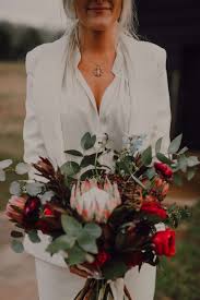 Bouquet by @petalsandfields for jewel and joey's outdoor garden wedding at @cjsoffthesquare | we are crushing on the mix of fresh and dried flowers and all the beachy boho. Destination Wedding Planner For Adventure Festival Weddingsnashville Elopement 6 Destination Wedding Planner For Adventure Festival Weddings