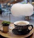 Cloud coffee' is served with a cloud of cotton candy over the cup ...
