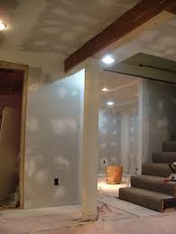 The excess water drainage points should be placed discreetly in the corner of the basement while transforming it into a new part of home. Finished Basement The Pros And Cons Of Doing A Basement Remodel The Homebuilding Remodeling Guide