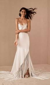 Other words to describe a simple wedding dress might be minimalist, sleek or effortless. 30 Elegant Slip Wedding Dresses For The Minimalist Bride Slip Wedding Dress Wedding Dresses Dresses