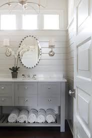 If you need a bathroom that's both efficient and refined, below are some ideas which may help you. Gray Washstand With Shelf And Oval White And Gray Mirror Transitional Bathroom Sherwin Williams Agreeable Gray