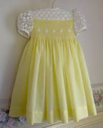 Hand Smocked Girls Dress Yellow And White Easter Dress Etsy In 2020 Girls Smocked Dresses Small Girls Dress Baby Frocks Designs
