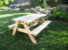 This picnic table follows the classic design where the benches are connected to the table. Build A Bigger Kids Picnic Table Plans Ana White