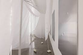 At some points, the logs go across the walls, which help. Carlito Carvalhosa I Do Everything To Do Nothing At Galeria Nara Roesler