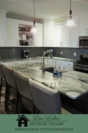 Charcoal is the perfect color if you like the moodiness of dark shades, but don't want the harsh boldness of black. Modern Farmhouse Kitchen Remodel White Shaker Cabinets Gray Island