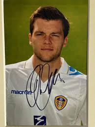 Leeds United Jonny Howson 2011 SIGNED photograph 6x4" in mount